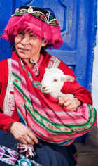 Peruvian woman with young lamb Peruvian woman with young lamb