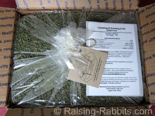 Open box of Sherwood feed, plastic still sealed