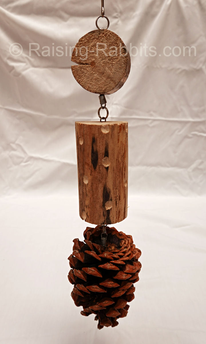 Wood and pinecone rabbit chew toy Wood and pinecone rabbit chew toy