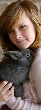 Teen girl with gray pet rabbit Teen girl with gray pet rabbit